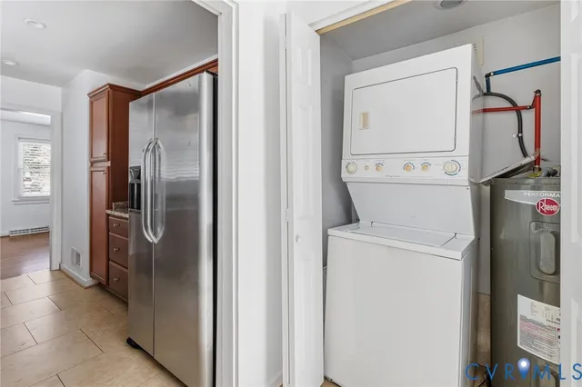 a view of storage and utility room with washer and dryer