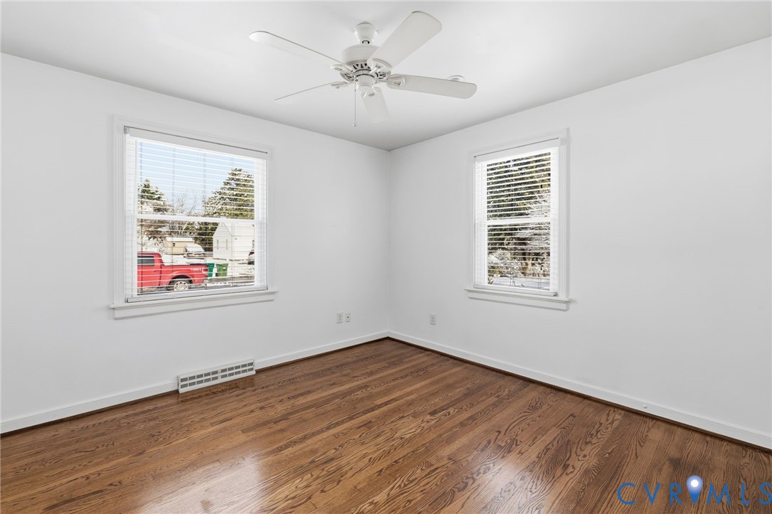 7117 Brigham Road Richmond, VA 23226 - Photo 15 of 20 wooden floor in an empty room with a window