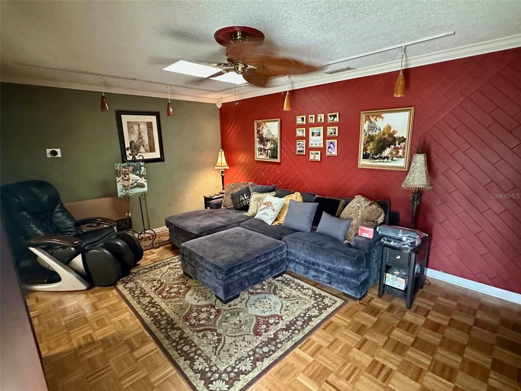 300 Broadview Avenue Altamonte Springs, FL 32701 - Photo 17 of 33 a living room with furniture rug and window