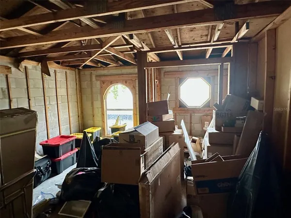 a view of empty room with windows