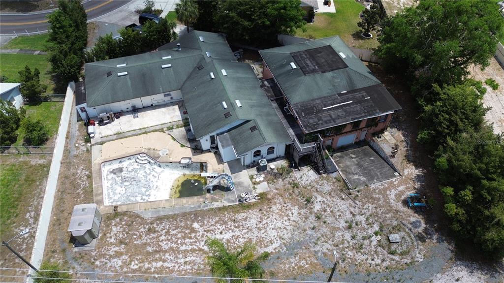 300 Broadview Avenue Altamonte Springs, FL 32701 - Photo 5 of 33 an aerial view of a house with a yard and large trees