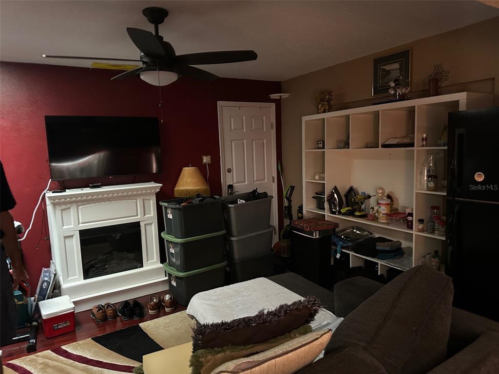 300 Broadview Avenue Altamonte Springs, FL 32701 - Photo 8 of 33 a room with furniture and a fireplace