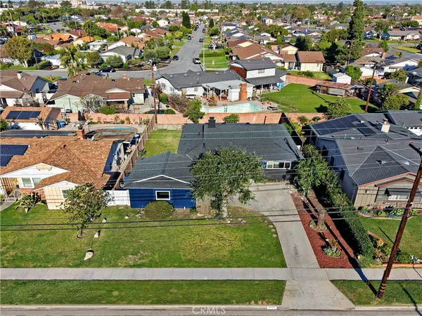 an aerial view of houses and roads
