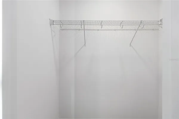 a bathroom with a double vanity sink toilet mirror and shower