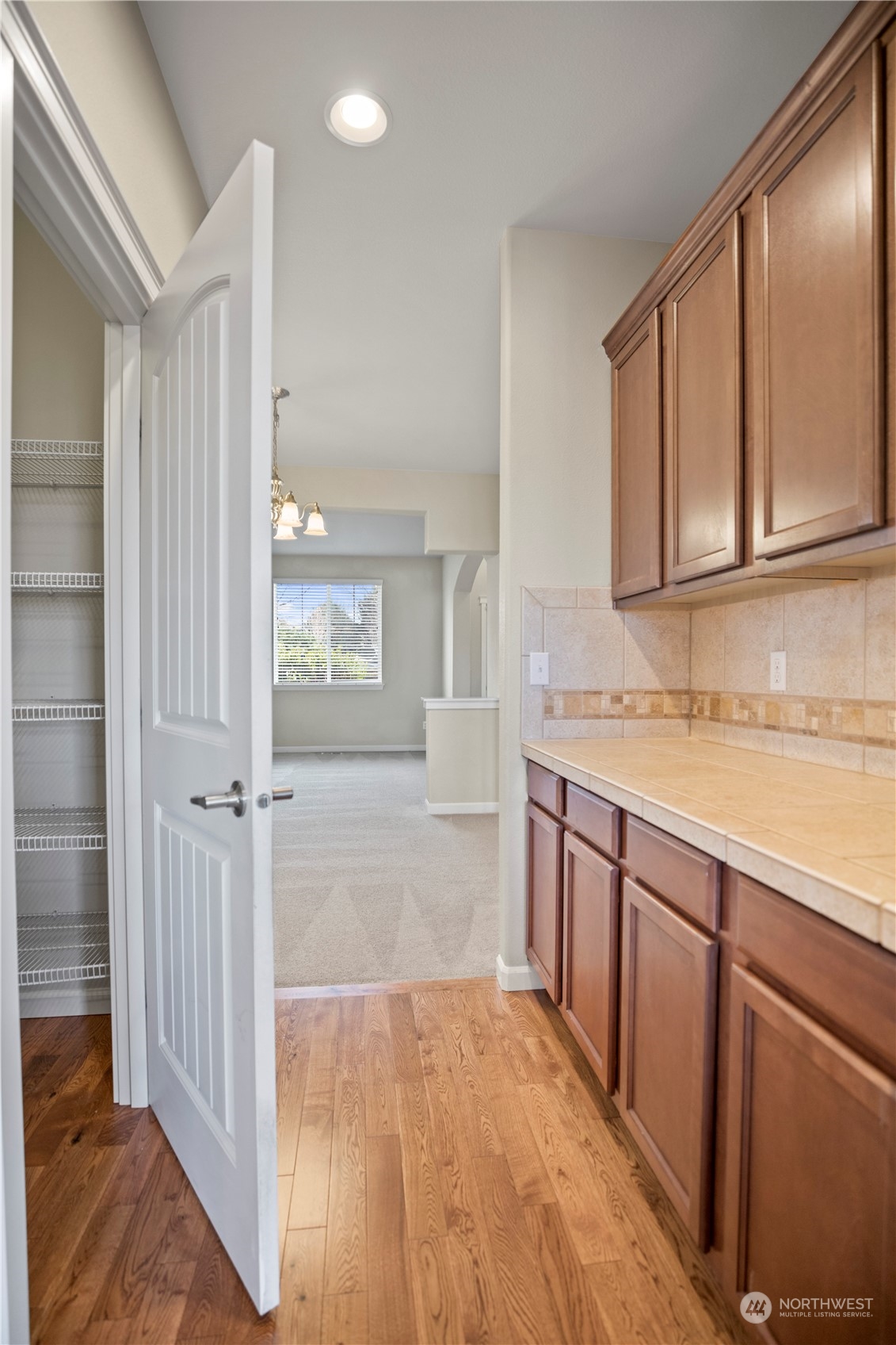1534 Farina Loop Southeast Olympia, WA 98513 - Photo 12 of 38 a bathroom with a granite countertop sink and a mirror
