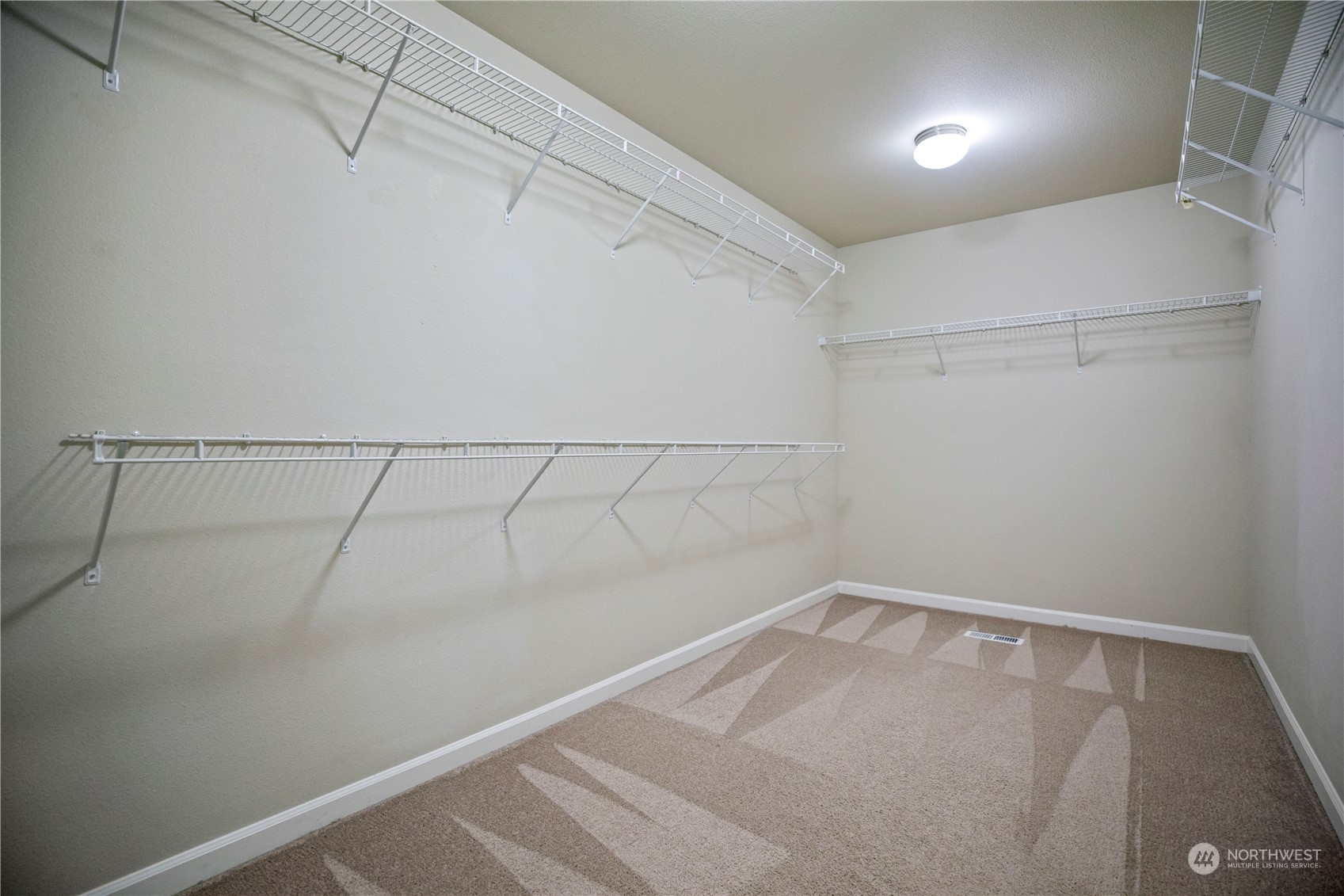 1534 Farina Loop Southeast Olympia, WA 98513 - Photo 23 of 38 a view of a room with racks on the wall