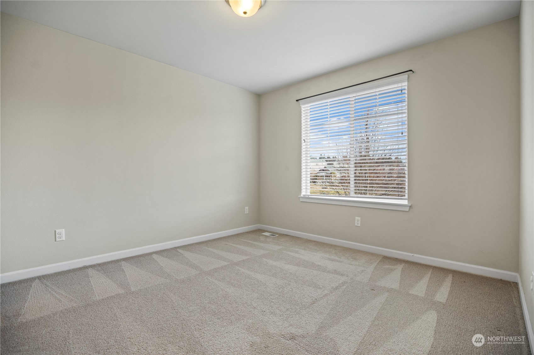 1534 Farina Loop Southeast Olympia, WA 98513 - Photo 28 of 38 an empty room with a window