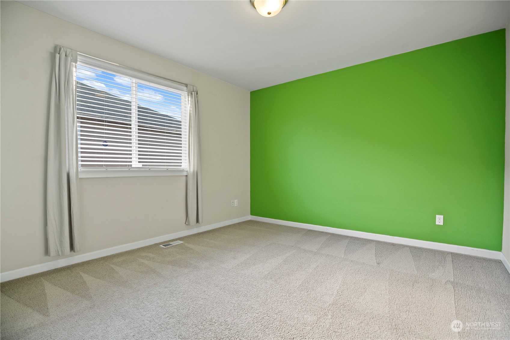 1534 Farina Loop Southeast Olympia, WA 98513 - Photo 29 of 38 an empty room with windows