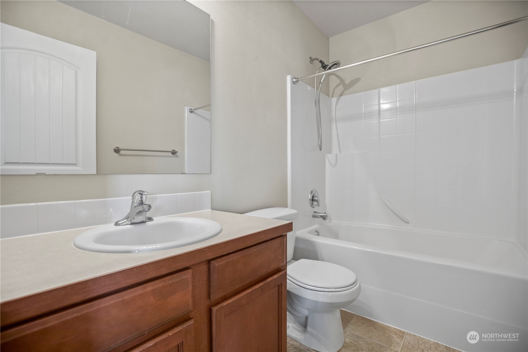 1534 Farina Loop Southeast Olympia, WA 98513 - Photo 31 of 38 a bathroom with a sink toilet and shower