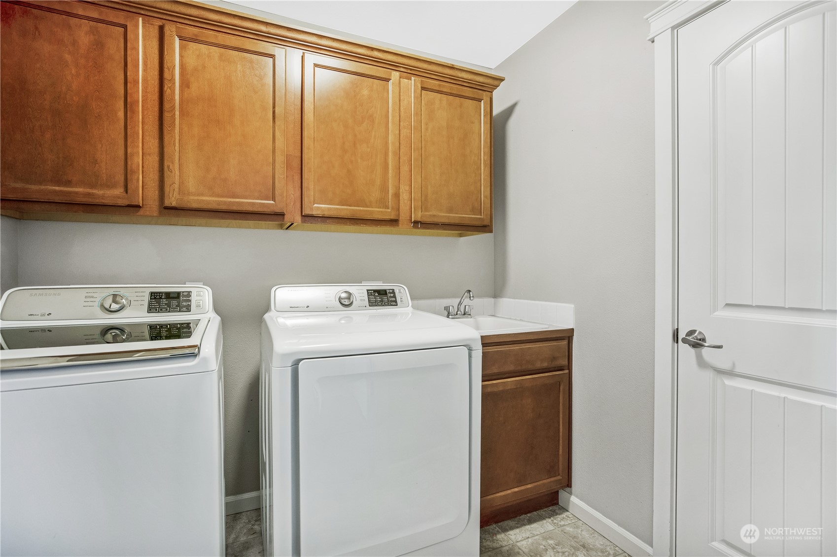 1534 Farina Loop Southeast Olympia, WA 98513 - Photo 32 of 38 a utility room with dryer and washer
