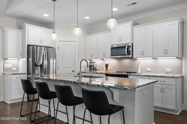 $545,000 | 2267 Reefside Loop Northeast, Leland, NC 28451