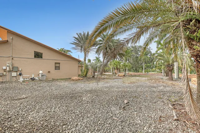a view of a swimming pool with a porch