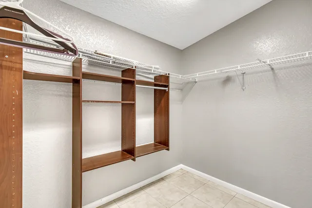 a view of a room that has a large window