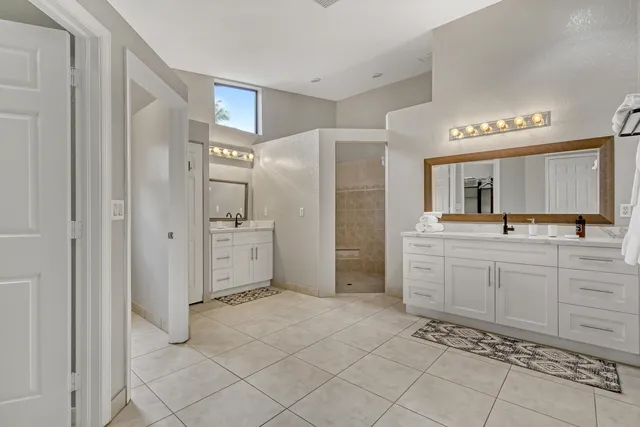 a view of a backyard with palm trees