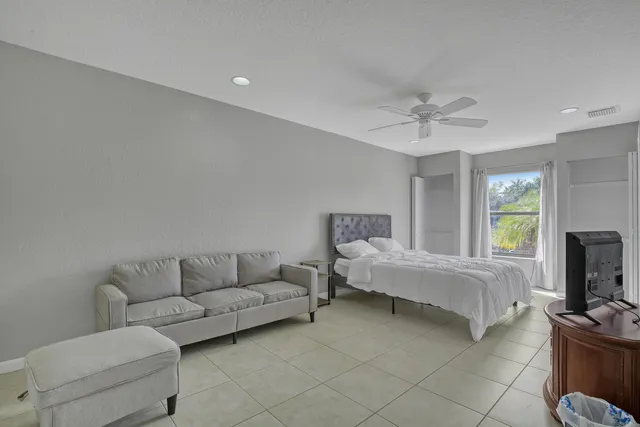 a kitchen with a sink and refrigerator