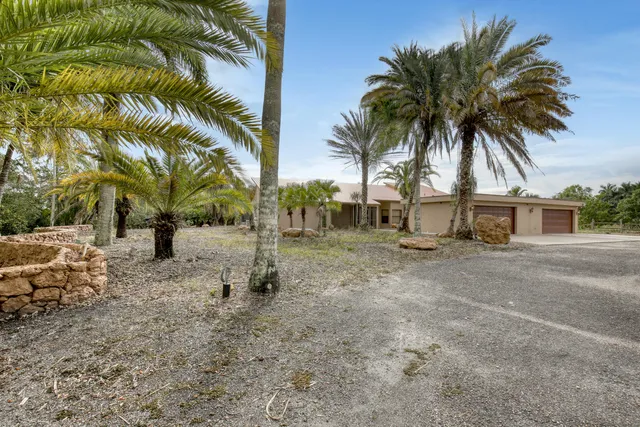 a view of backyard with green space