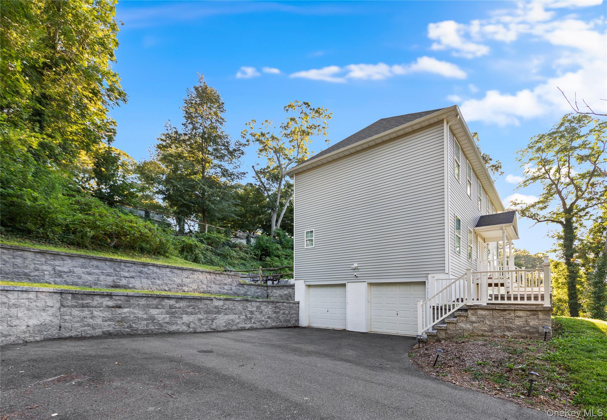 24 Belmont Road Sound Beach, NY 11789 - Photo 19 of 23 a view of a house with a yard