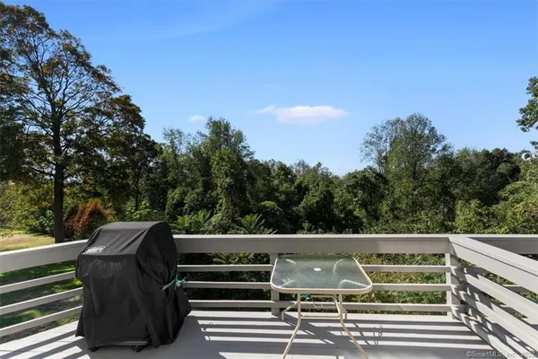 a view of a balcony with an outdoor space