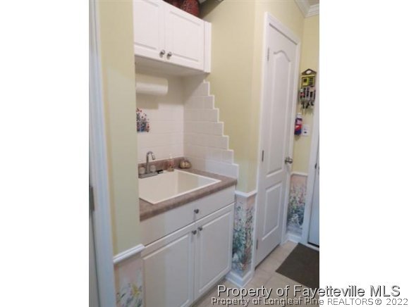 293 Ridge View Drive Cameron, NC 28326 - Photo 13 of 25 a bathroom with a sink and a mirror