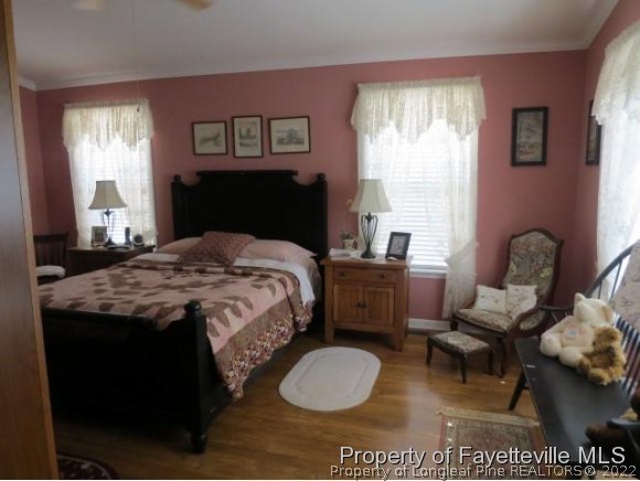293 Ridge View Drive Cameron, NC 28326 - Photo 15 of 25 a bedroom with a bed and a couch