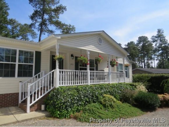 293 Ridge View Drive Cameron, NC 28326 - Photo 3 of 25 a view of a house with a porch