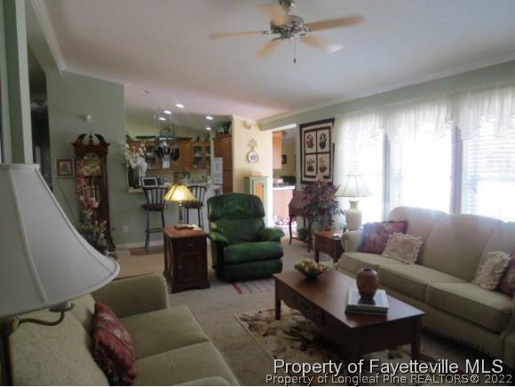 293 Ridge View Drive Cameron, NC 28326 - Photo 6 of 25 a living room with furniture and a large window