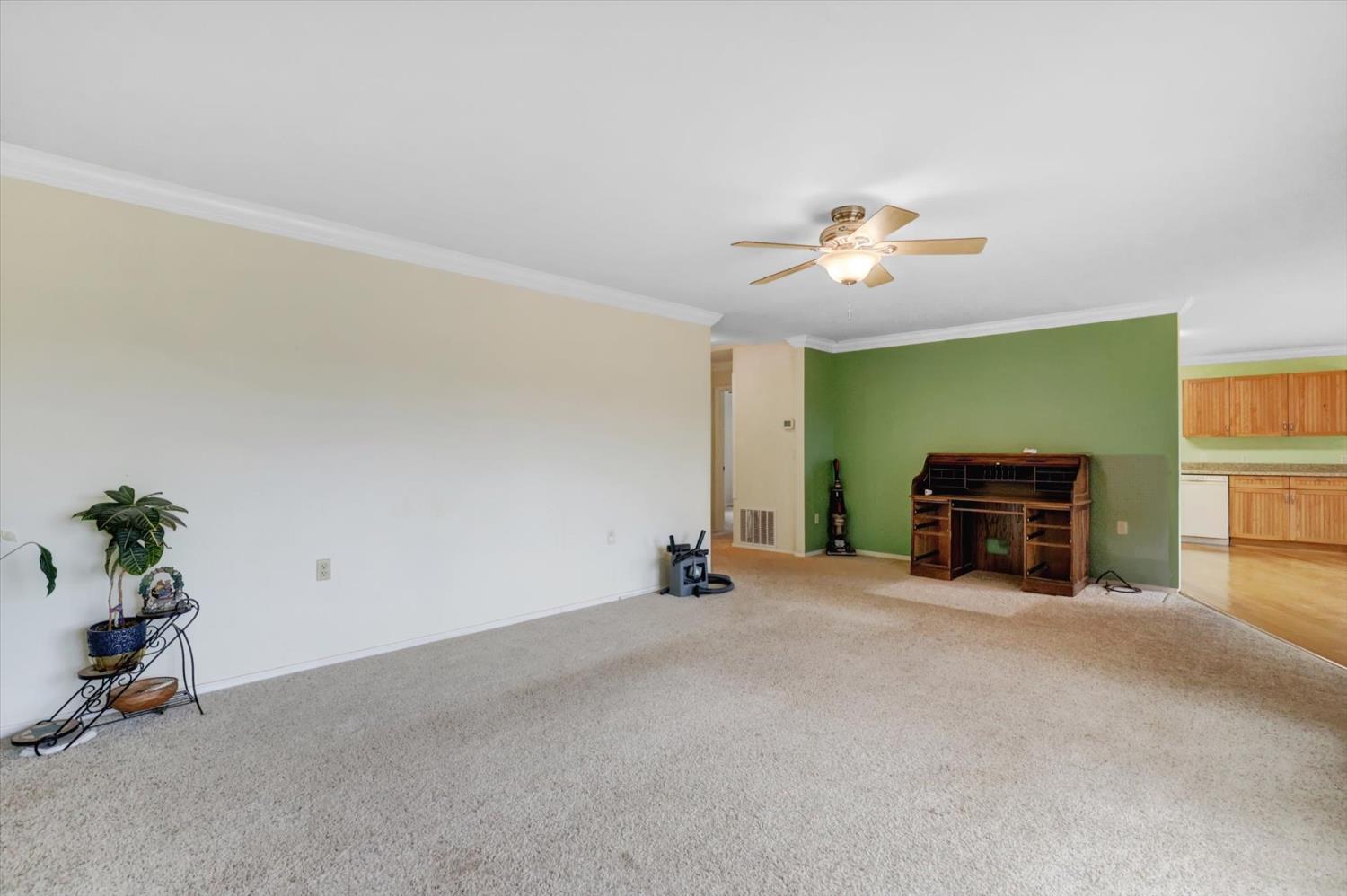 19121 Hiers Road Grass Valley, CA 95949 - Photo 19 of 94 a view of a livingroom with a ceiling fan and a couch