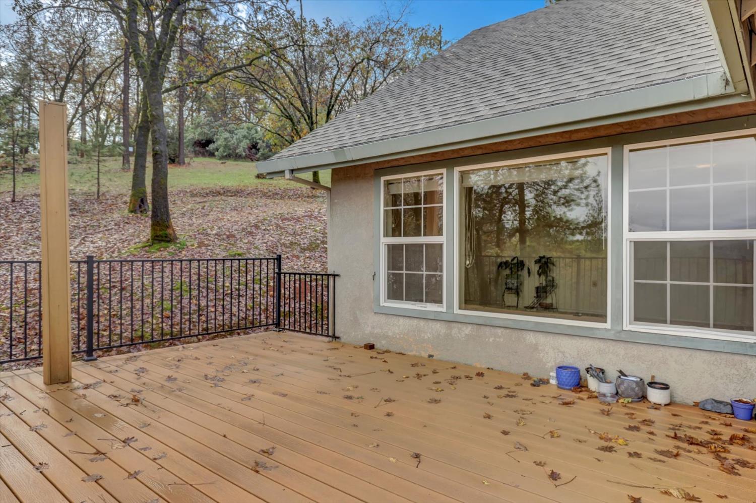 19121 Hiers Road Grass Valley, CA 95949 - Photo 39 of 94 a view of a brick house with a large window