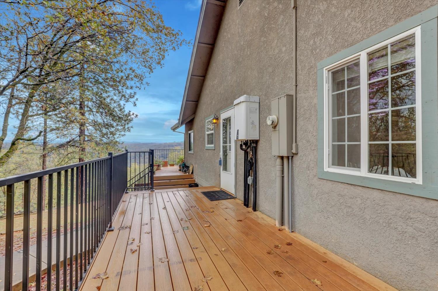 19121 Hiers Road Grass Valley, CA 95949 - Photo 50 of 94 a view of balcony with wooden floor and fence