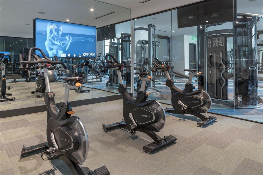 733 Main Lane, Unit 2 Orlando, FL 32801 - Photo 13 of 19 a view of a room with gym equipment