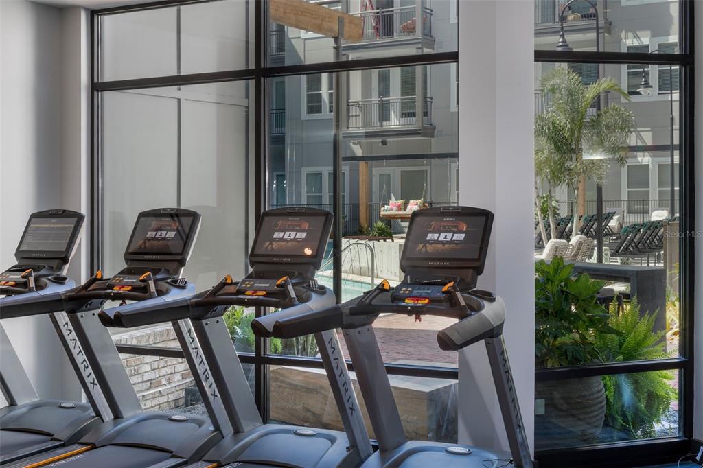 733 Main Lane, Unit 2 Orlando, FL 32801 - Photo 14 of 19 a view of a workspace with furniture and a window