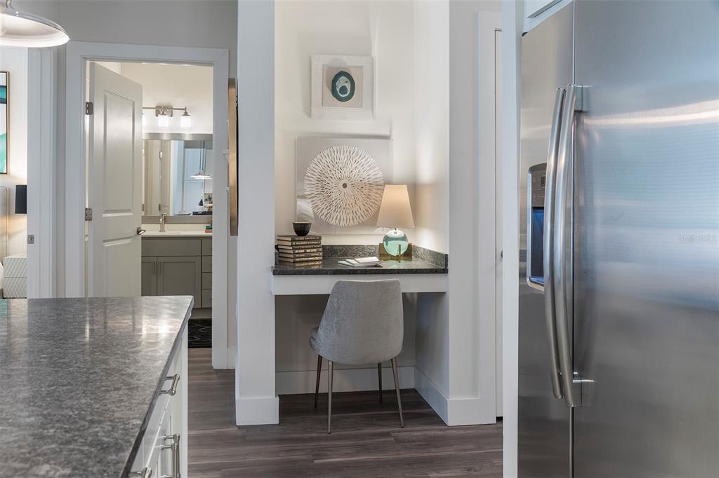 733 Main Lane, Unit 2 Orlando, FL 32801 - Photo 16 of 19 a view of kitchen with furniture and wooden floor