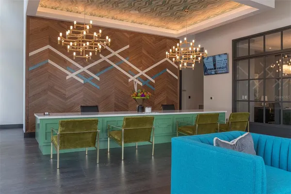 a room with furniture and a chandelier