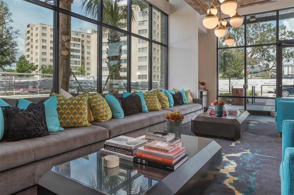 733 Main Lane, Unit 2 Orlando, FL 32801 - Photo 6 of 19 a living room with furniture and a large window