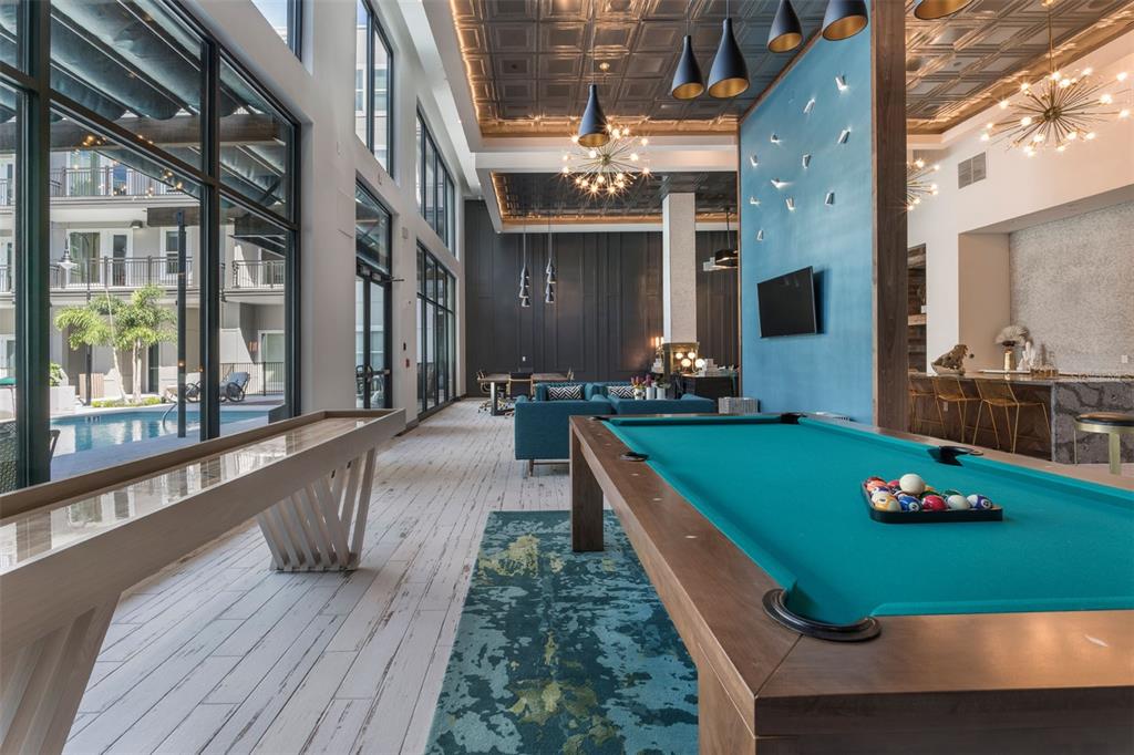 733 Main Lane, Unit 2 Orlando, FL 32801 - Photo 9 of 19 a room with pool table and windows