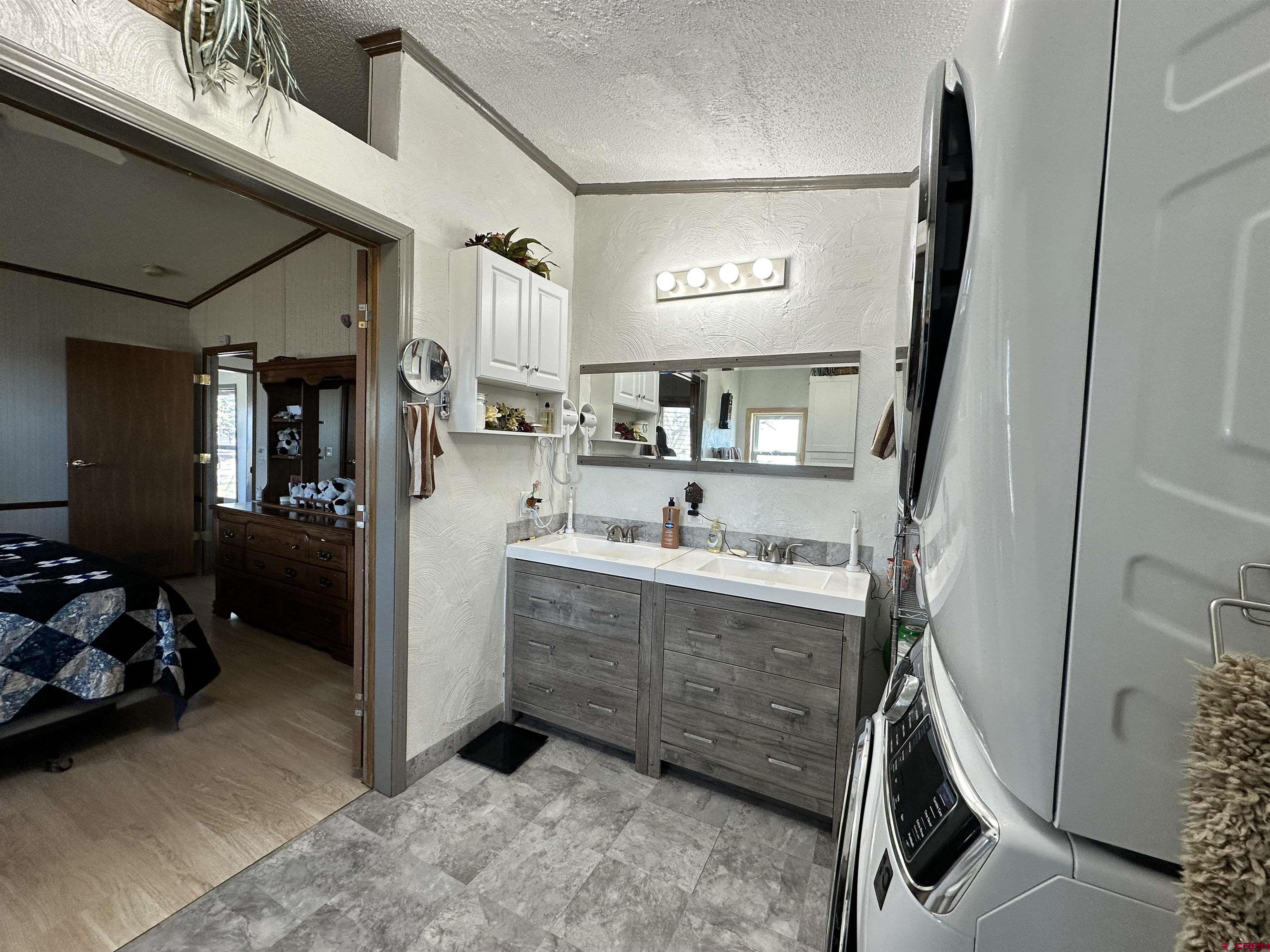 12880 2900th Road Hotchkiss, CO 81419 - Photo 10 of 22 a view of living room with furniture and a mirror