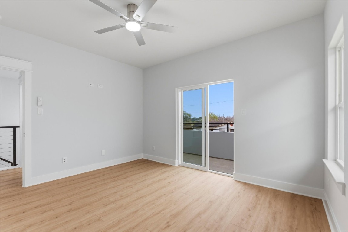 11626 Flintlock Road La Porte, TX 77571 - Photo 18 of 26 wooden floor in an empty room with a window