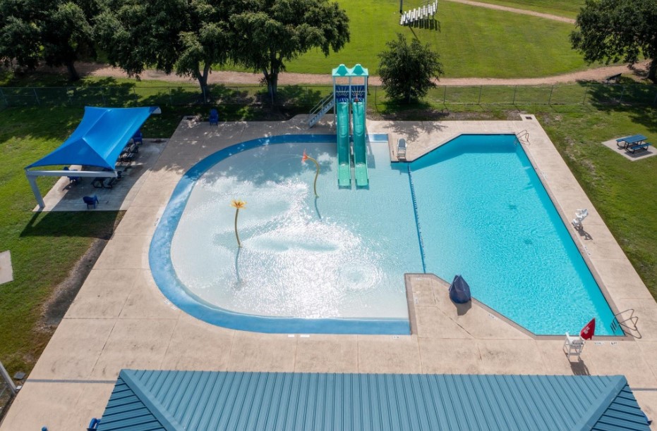 11626 Flintlock Road La Porte, TX 77571 - Photo 24 of 26 swimming pool view with a sitting space
