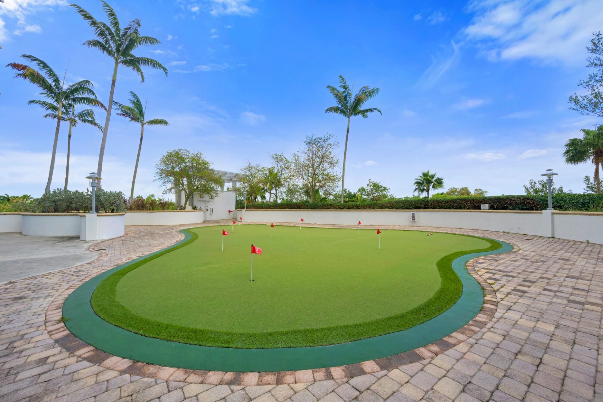 2641 North Flamingo Road, Unit 2108N Sunrise, FL 33323 - Photo 11 of 52 a view of a swimming pool with a yard