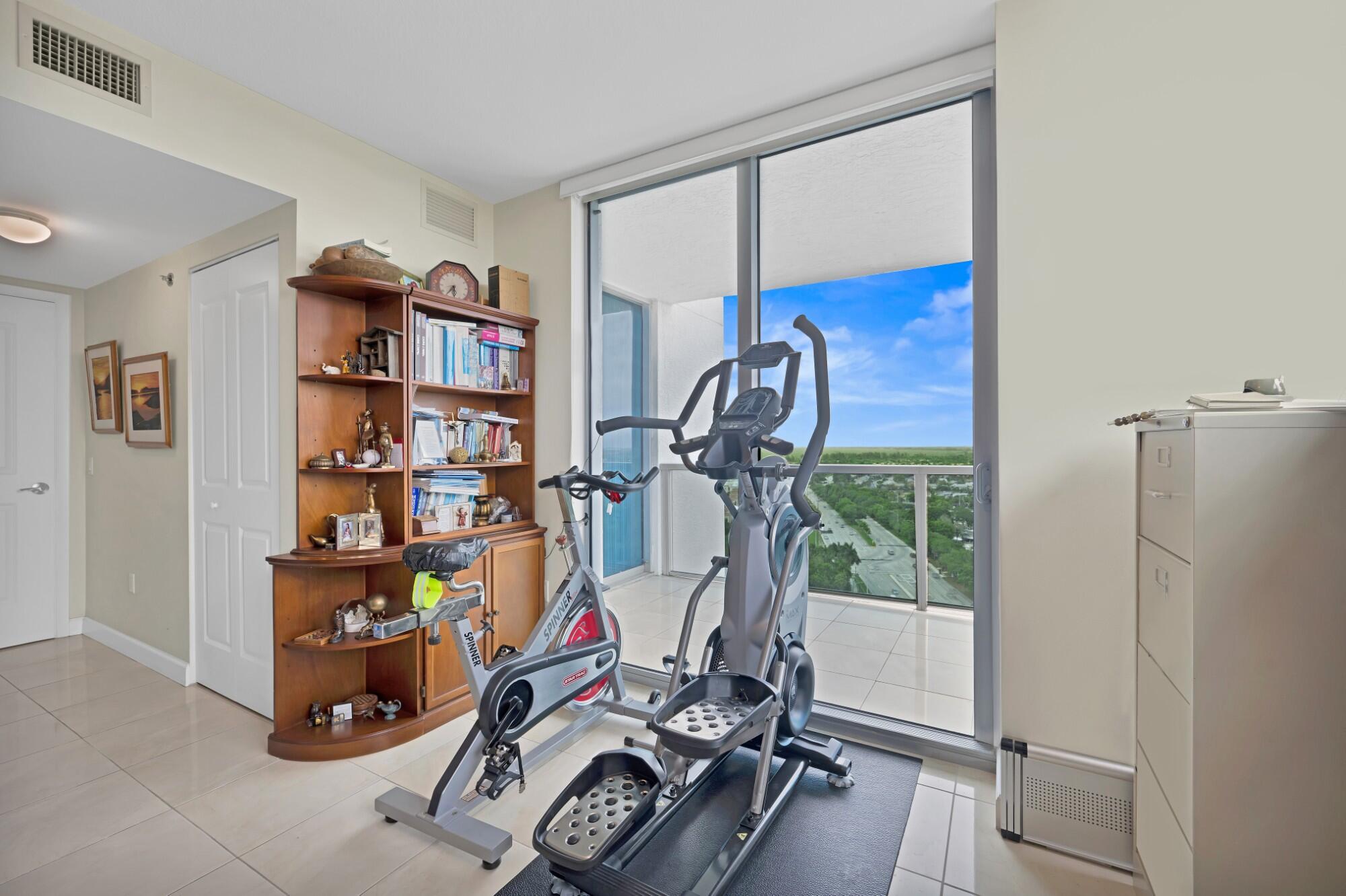 2641 North Flamingo Road, Unit 2108N Sunrise, FL 33323 - Photo 31 of 52 a view of a room with gym equipment