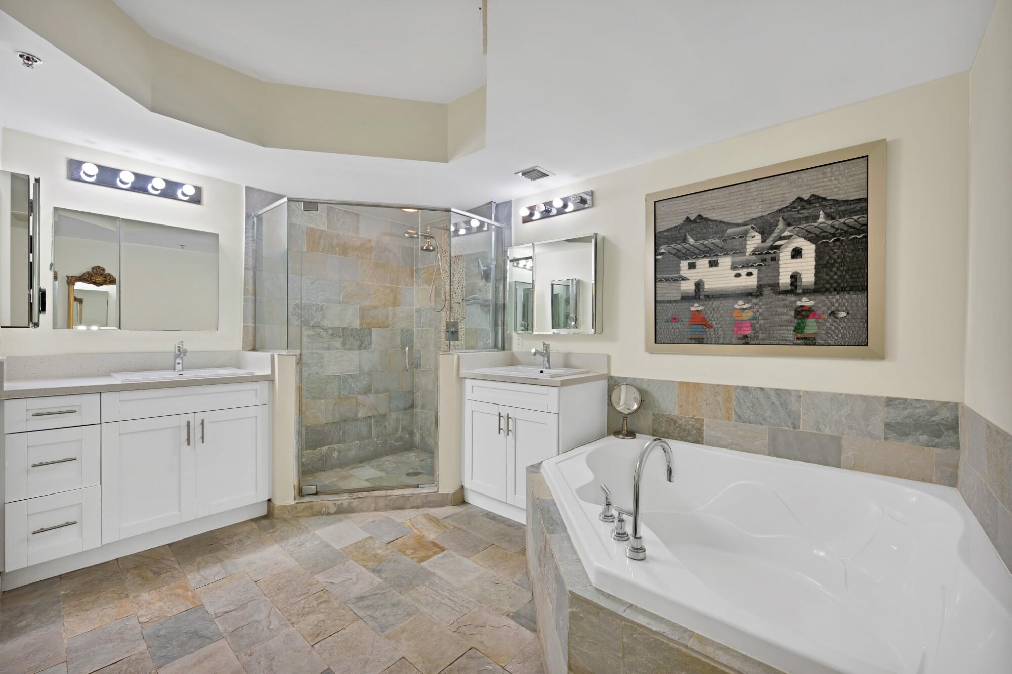 2641 North Flamingo Road, Unit 2108N Sunrise, FL 33323 - Photo 34 of 52 a bathroom with a sink mirror and a bath tub