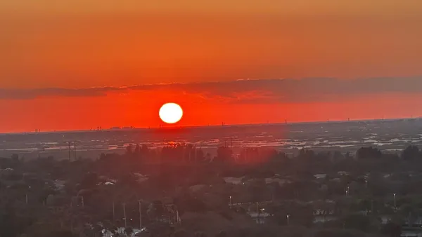a view of city and green space
