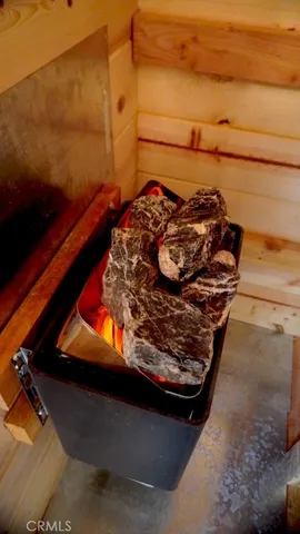 a view of a lounge chair on the wooden floor