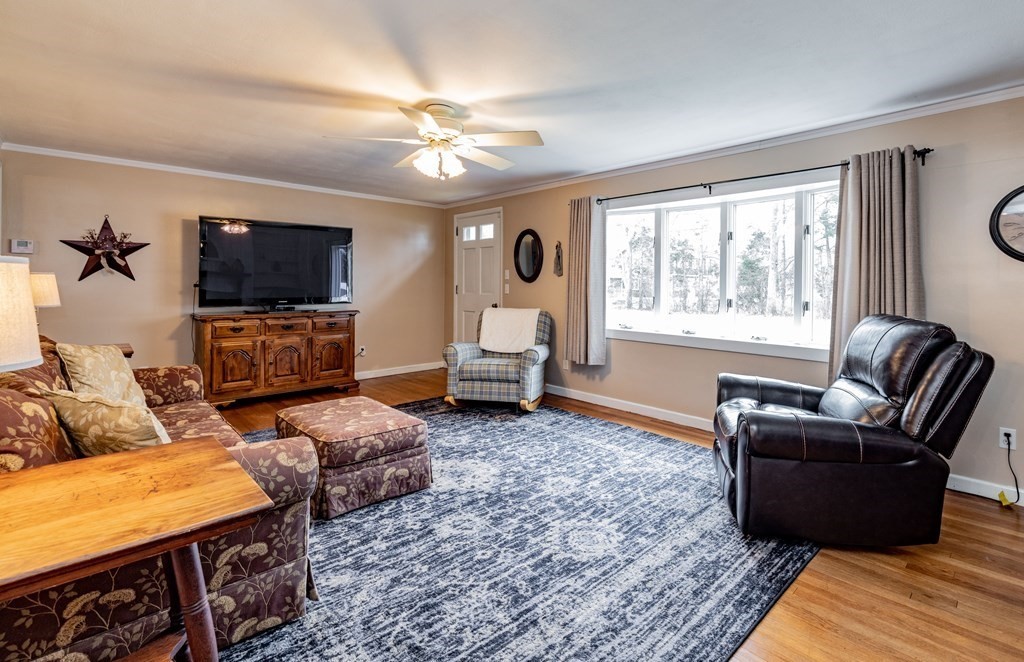 65 Mountain Road Holyoke, MA 01040 - Photo 12 of 35 a living room with furniture flat screen tv and large window