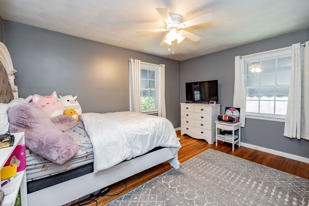 65 Mountain Road Holyoke, MA 01040 - Photo 17 of 35 a bedroom with a bed and a tv
