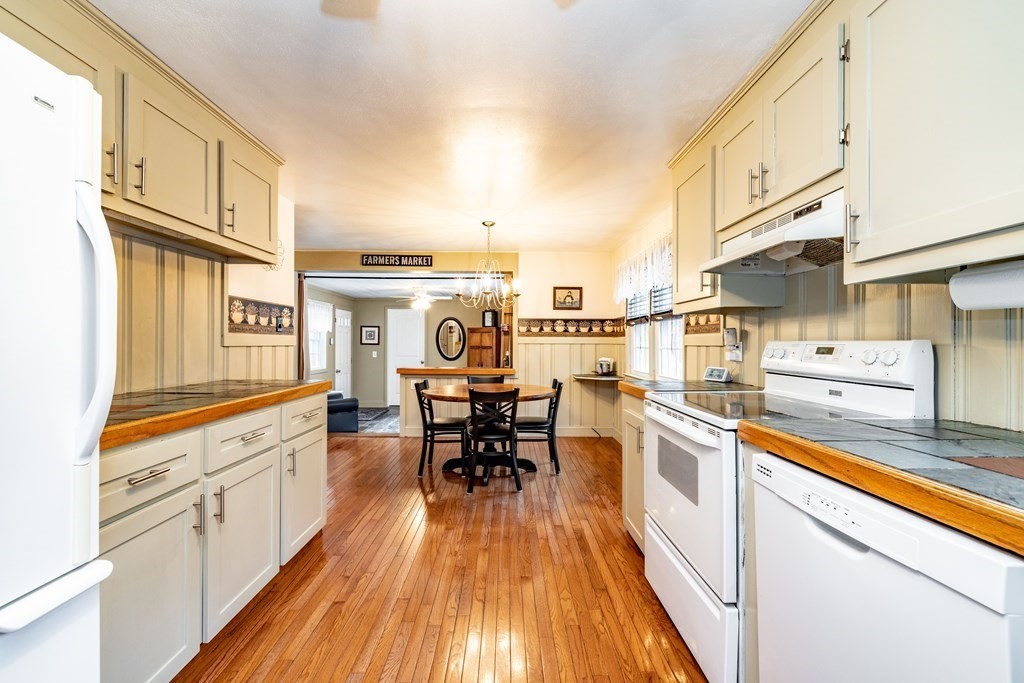 65 Mountain Road Holyoke, MA 01040 - Photo 8 of 35 a kitchen with stainless steel appliances a stove a sink and cabinets