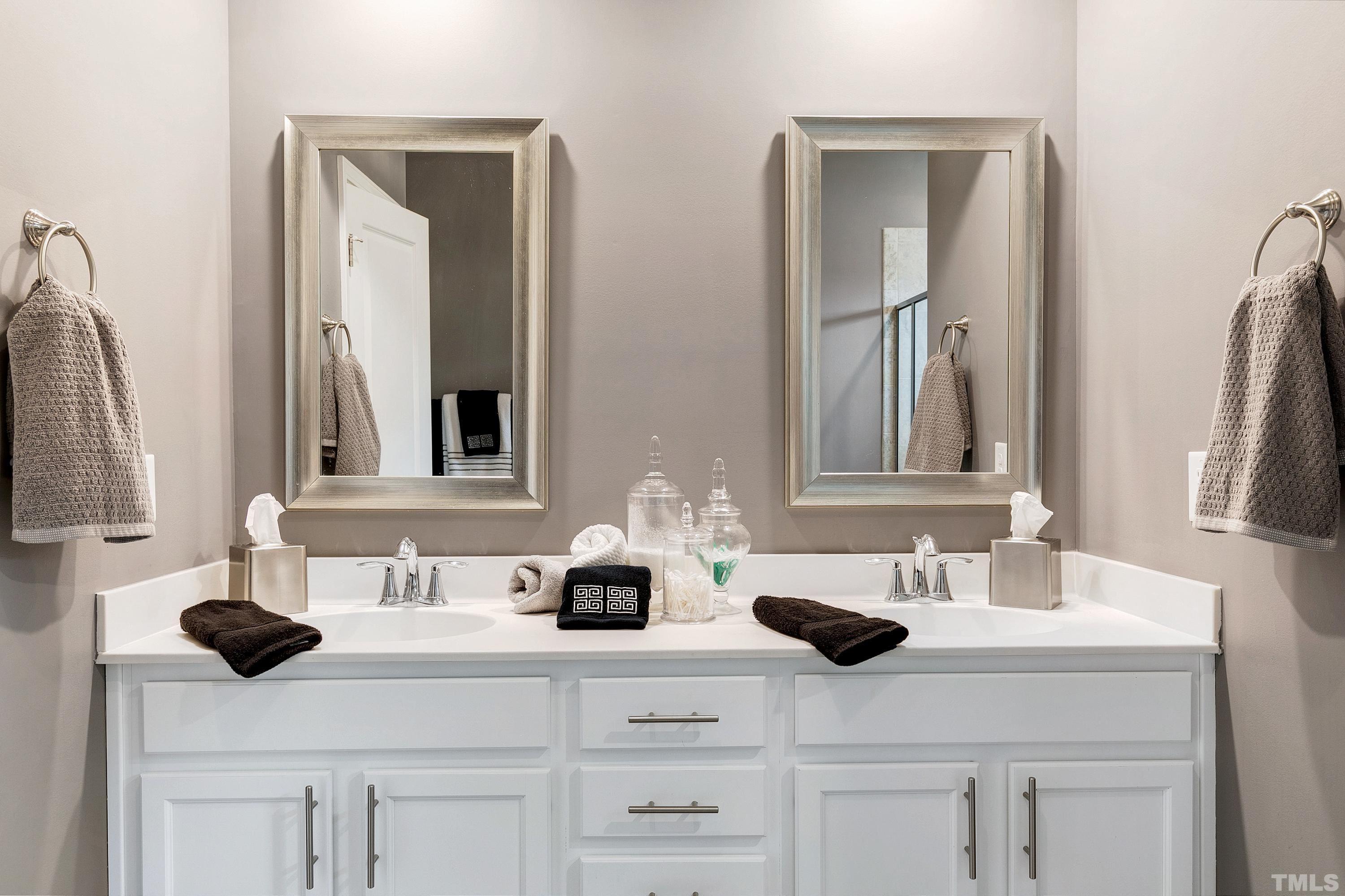 1161 Lookout Ridge Road Apex, NC 27502 - Photo 28 of 36 a bathroom with double sink and two mirror