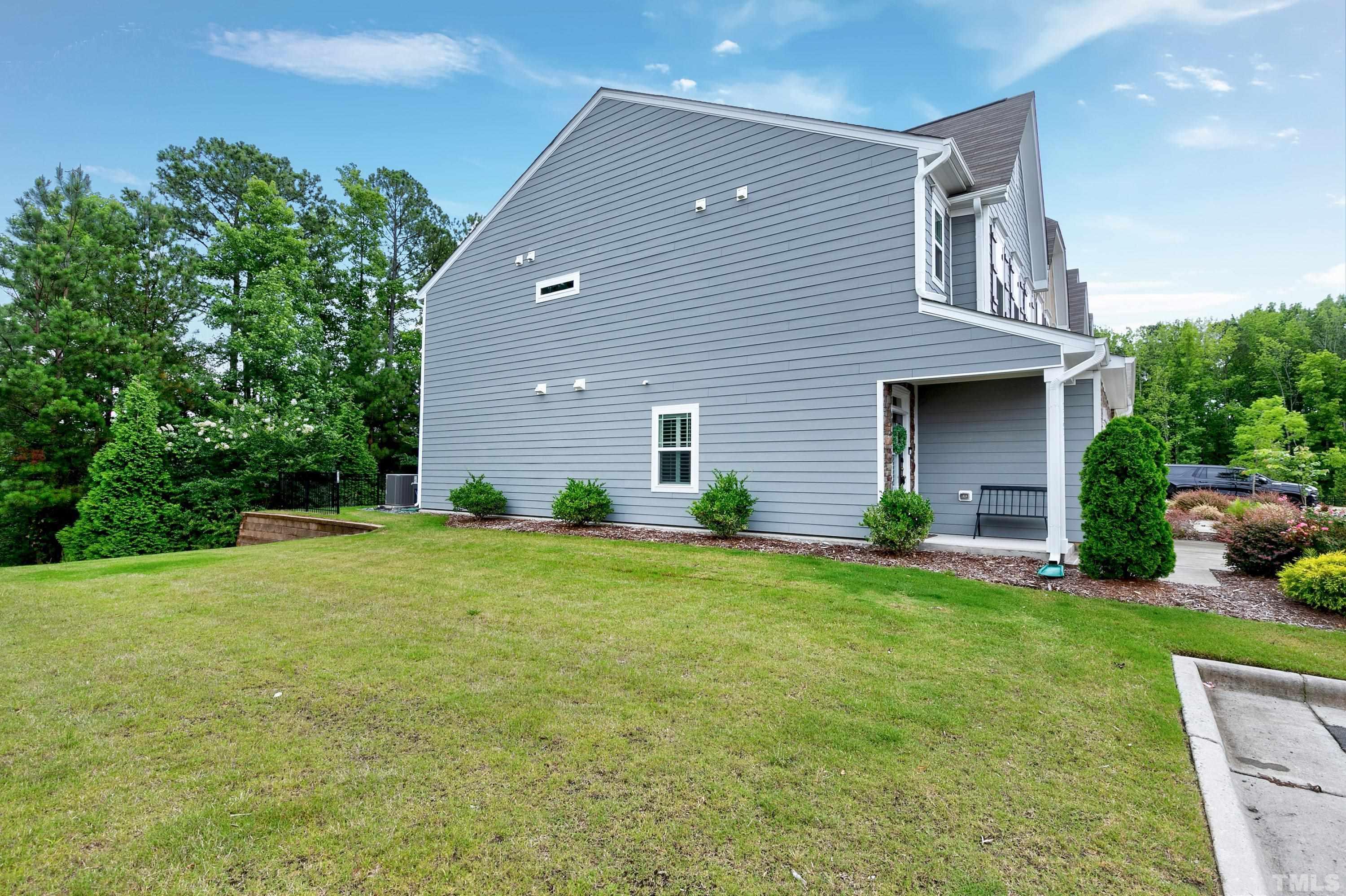 1161 Lookout Ridge Road Apex, NC 27502 - Photo 33 of 36 a house view with a garden space