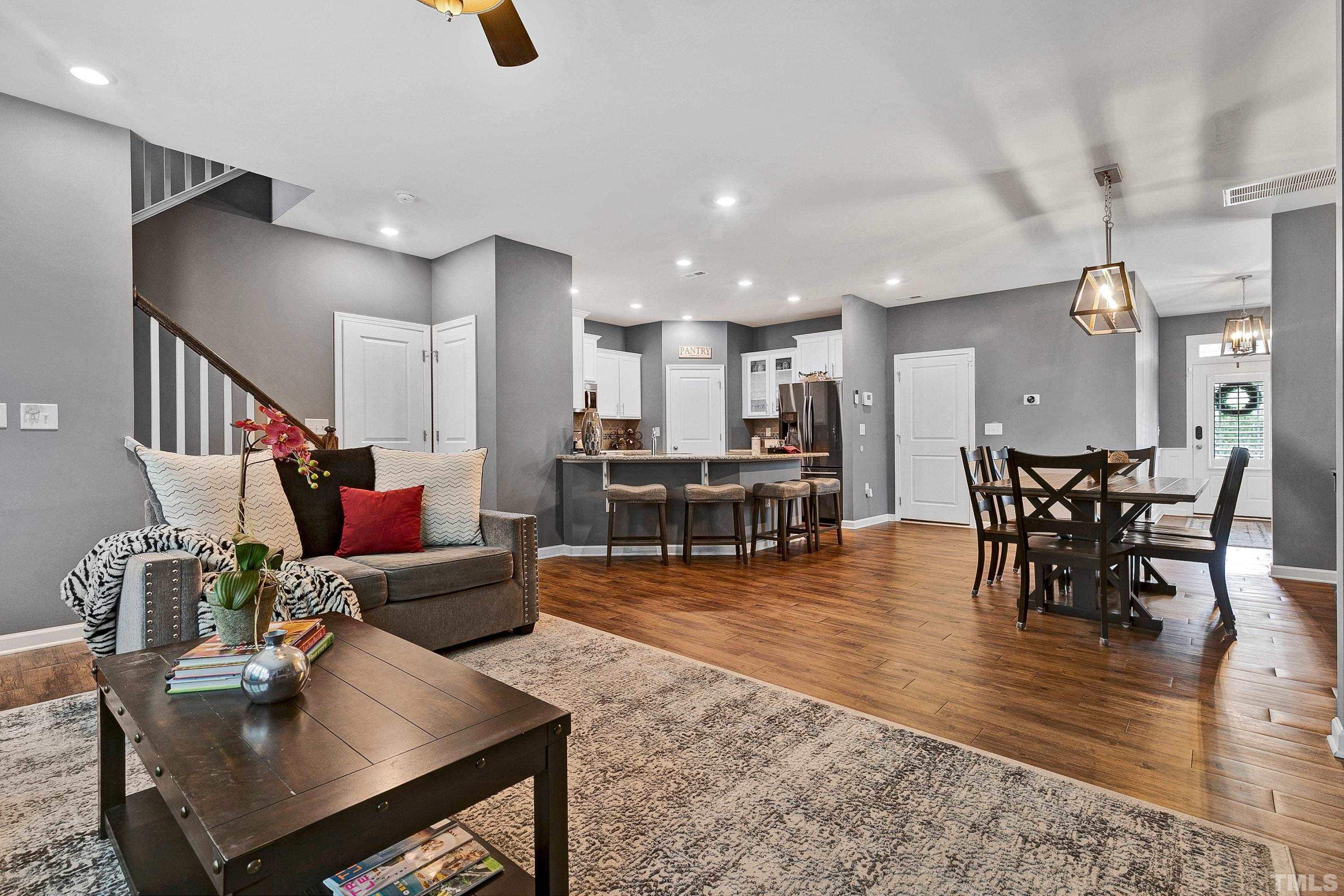 1161 Lookout Ridge Road Apex, NC 27502 - Photo 10 of 36 a living room with dining room and kitchen view