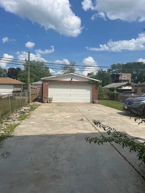 9735 South Michigan Avenue, Unit 1 Chicago, IL 60628 - Photo 17 of 17 a view of a lake with a big yard